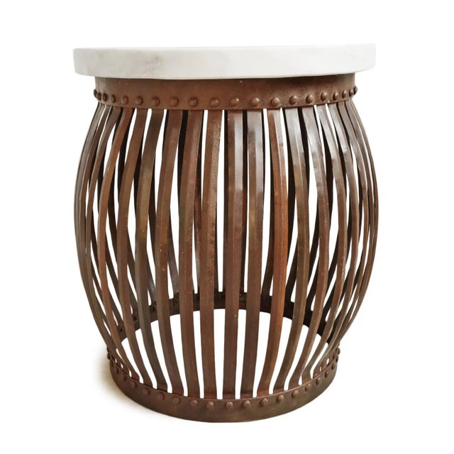 Vintage white marble top round side table with vintage rusted iron strap barrel base. Each table unique in natural marble...