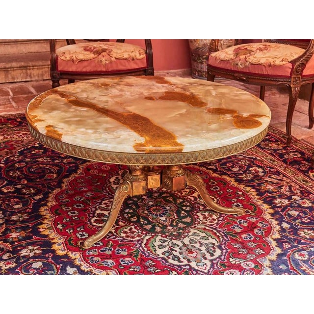 Heavy metal base. Top onyx tabletop made of natural stone, has a polished edge and is newly professionally restored. Top...