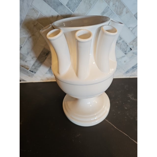 Bring timeless European-inspired elegance to your home with this **Vintage MCM Abigails China white ceramic tulipiere...