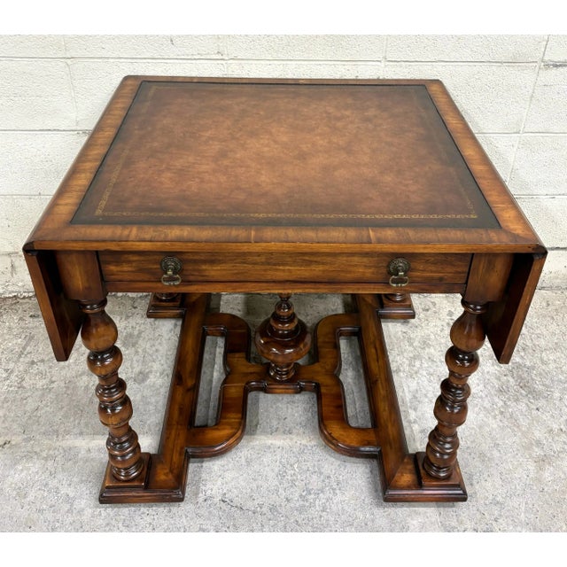 This is an absolutely gorgeous vintage French Louis XIII style drop leaf leather top writing table, console table, sofa...