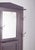Coat rack with mirror. A functional and robust piece, ideal for entrances or corridors. In dark wood, its design is sober...
