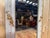 A napoleon iii period side mirror, narrow and elongated (h. 164 cm × w. 48 cm), made of wood and stucco. the frame has...