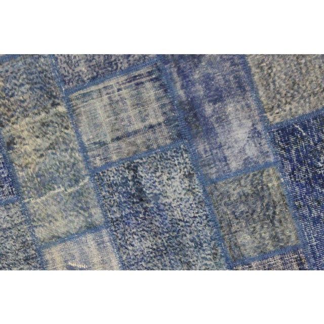 A beautiful antique Patchwork Rug. It's in very good condition, practically new. This Patchworks Rug is produced of older...