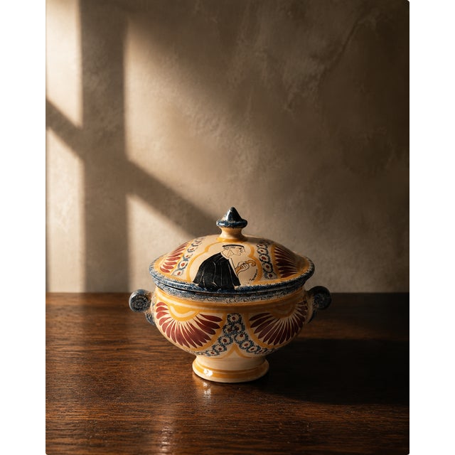 This polychrome faience covered bowl was created after a design by jacques le tanneur for dax, france, circa 1930. Likely...