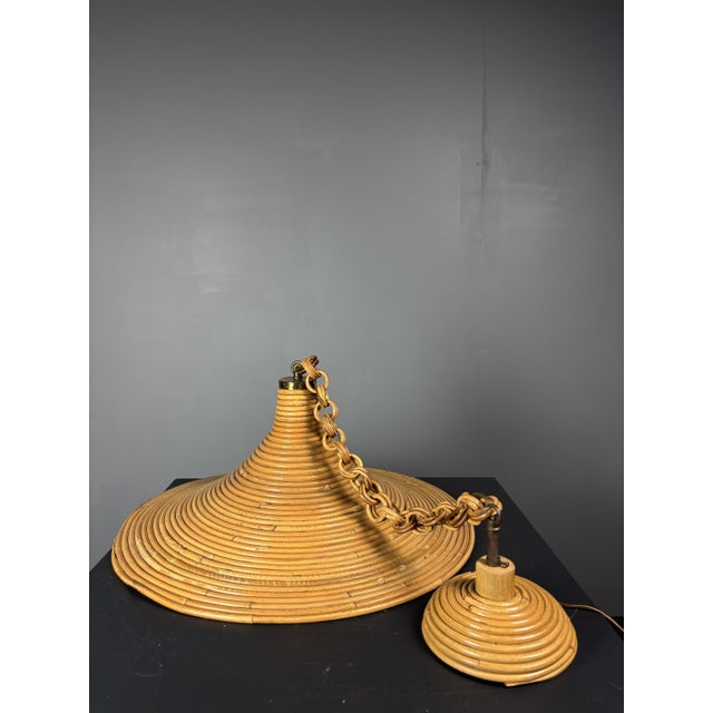 Lovely pencil reed or split reed rattan pendant, Italy, 1970s. This witch hat shaped hanging lamp is in great vintage...