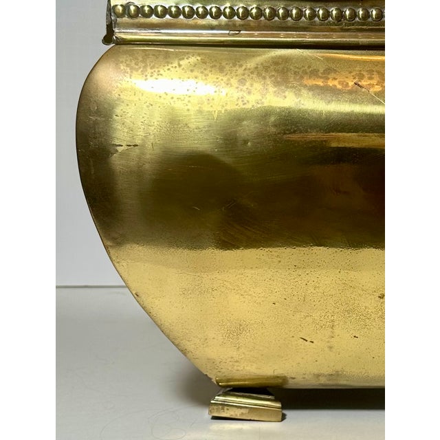 Antique Edwardian Traditional Brass Fireplace Coal Scuttle This early 20th century English solid brass coal scuttle with...