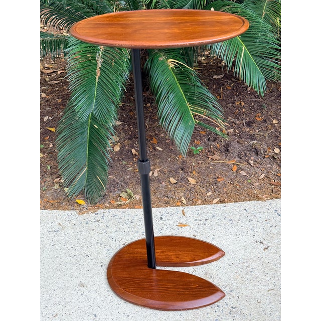 Ekornes Stressless Ellipse Table made in Norway. This is a functional accent table featuring an adjustable height design...