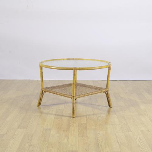 This bright, round coffee table, dating back to the 1950s, is a perfect example of modernism with an organic and natural...