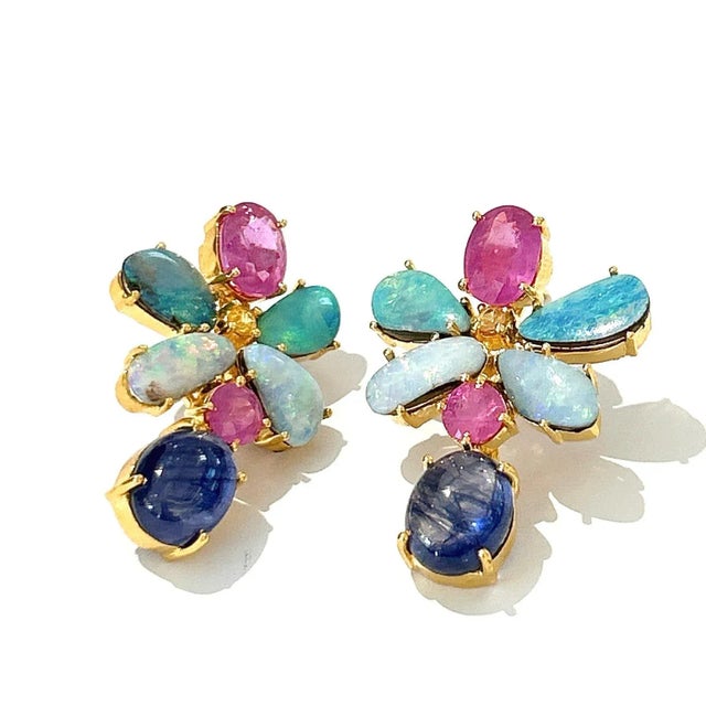 This is part of Chairish’s Fine Jewelry assortment. Natural Rubies - 4 carat Natural Blue Opal- 2.50 carat Natural Blue...