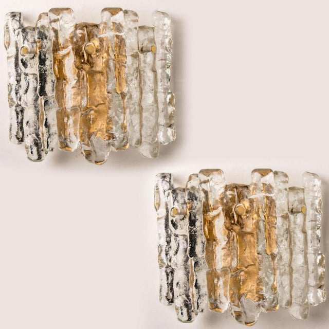 Beautiful and elegant modern ice glass and brass wall lights / sconces, manufactured by J.T. Kalmar, Austria in the 1970s....