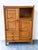 A beautiful and highly characteristic oak cabinet designed by robert guillerme and jacques chambron for votre maison,...