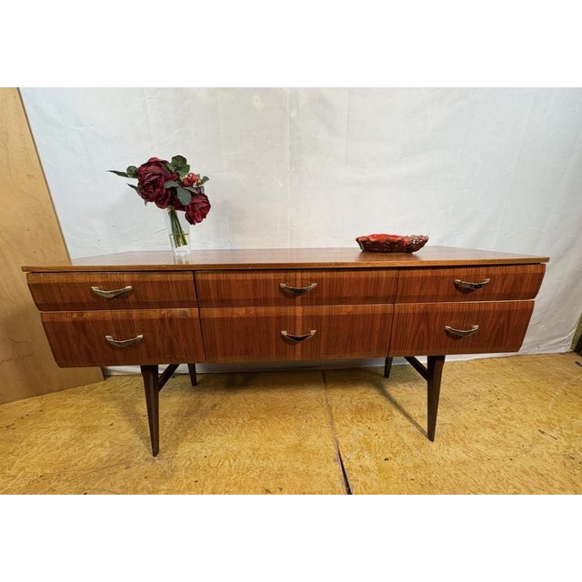 Mid-century retro vintage tola wood sideboard by meredew, designed by alphons loebenstein 1960s. This stunning tola wood...