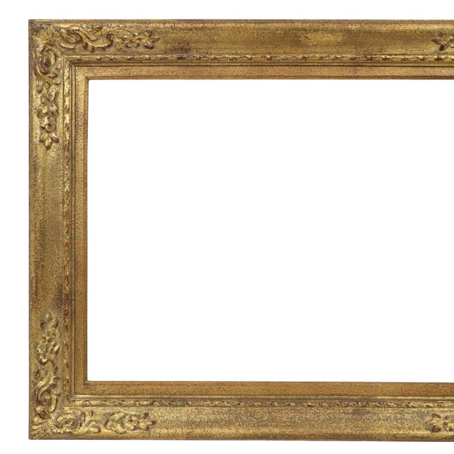 Small Baroque-style frame featuring acanthus and floral ornamentation at the corners and a ribbon pattern along the edges;...