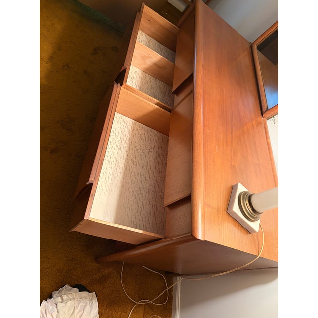 This 1960s Parallel by Drexel walnut lowboy has 6 spacious drawers. All drawer dividers can be remove or adjusted to...