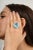 This beautifully handcrafted cocktail ring features a stunning 35.2 CTW sky blue topaz, complemented by shimmering...