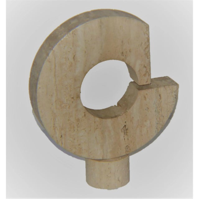 Italian Travertine Kinetic sculpture style of Raymor Fratelli Manelli circa 1970s. Sculpture sits on round plinth base...