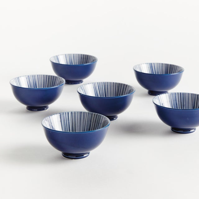 Set the table with a composition in blue. This little stoneware dip bowl set with modern striated design are a bold pop of...