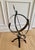 A beautifully crafted, late 20th Centuru iron armillary half-sphere, evoking the timeless elegance of classical European...