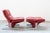 Lounge chair and pouf in red leather, with t -shaped metal structure, sandwich model, giampiero vitelli and titina...