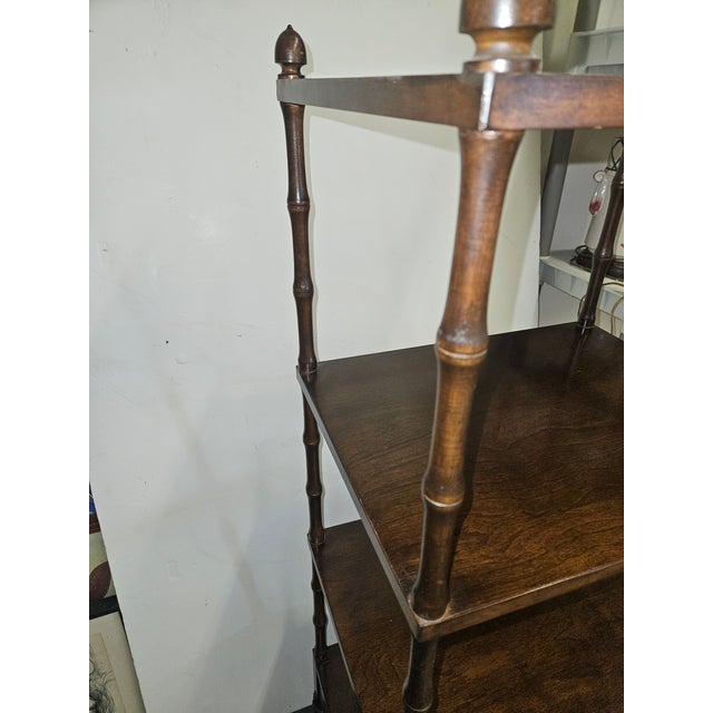Very nice Walnut Etagere with 3 tiers and a bottom drawer. Stylized Bamboo Turnings with Acorn Finials. Shelves are 12.5"...