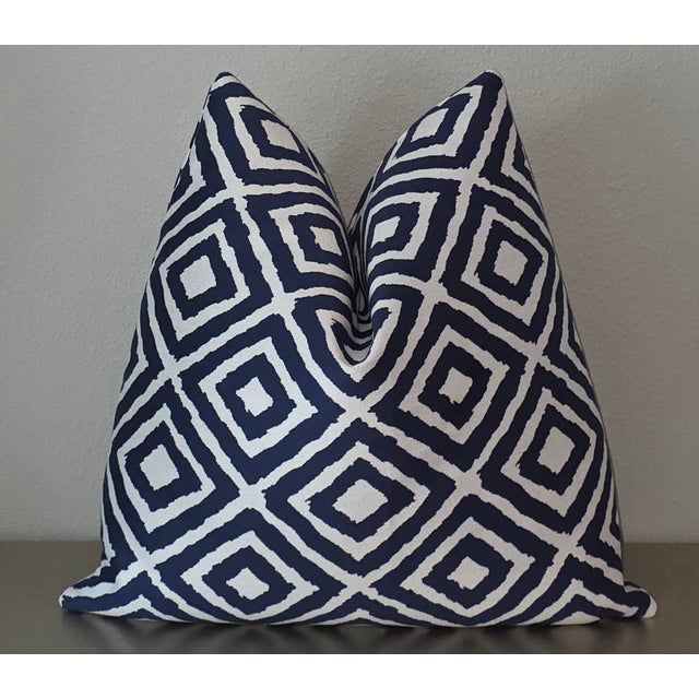 Enhance your living space with the sophisticated elegance of the Kravet Designer Navy Geometric Pattern Throw Pillows....