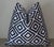Enhance your living space with the sophisticated elegance of the Kravet Designer Navy Geometric Pattern Throw Pillows....