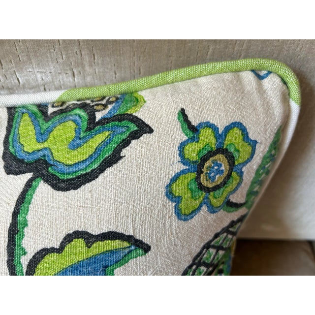 A pillow made from a circa 1950s French printed linen back with coordinating striped linen.