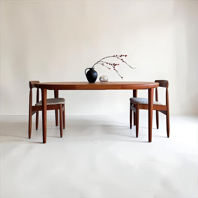 A beautiful, high-quality danish scandinavian dining table from the 1960s, in the mid-century modern design style, is...
