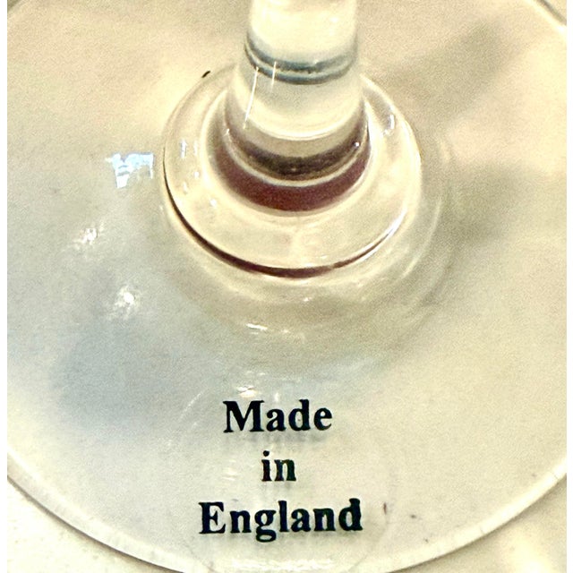 Cartier Tulip Crystal Champagne Glass * Design: Crystal flute with a wider, tulip-like bowl that tapers to a narrower...