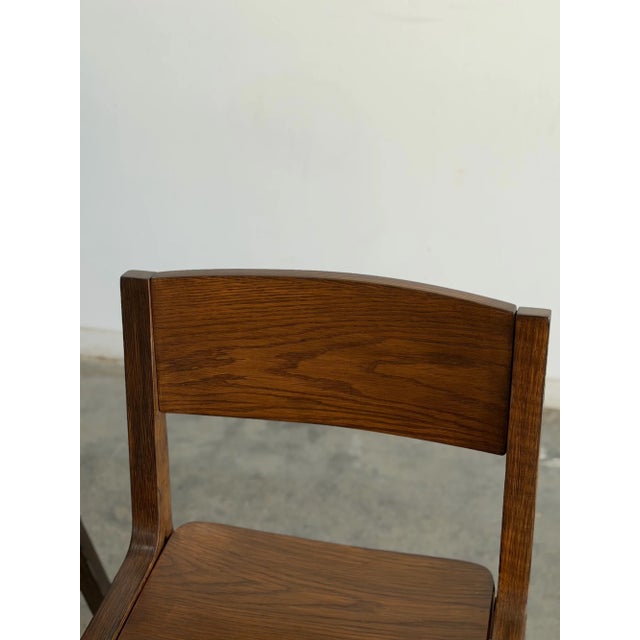 W20 D21.5 H31 SW17 SD18.5 SH17.5 Set of four vintage Thonet dining chairs featuring a clean, sculptural silhouette with...