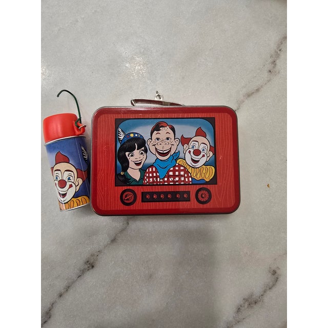 A delightful retro holiday collectible featuring the 1999 Hallmark Keepsake "School Days" series Howdy Doody ornament set....