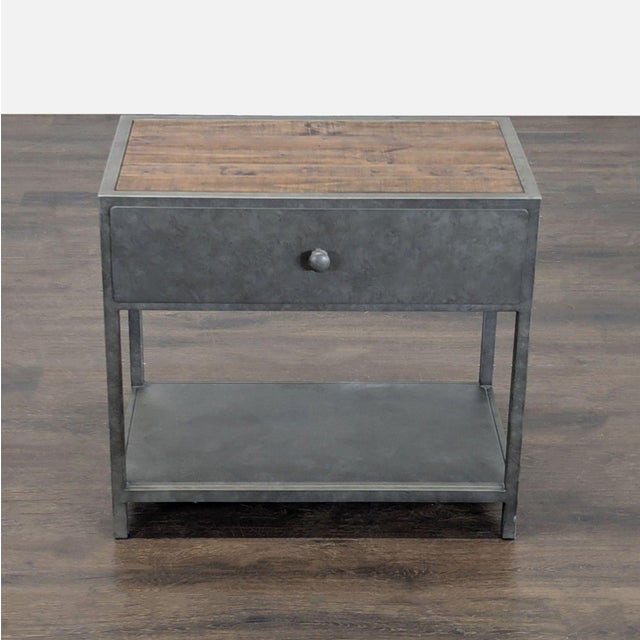 Metal nightstand with shelf and reclaimed wood top. Brand: Pottery Barn. Original Price: $449. Dimensions (in): 29W x 17D...