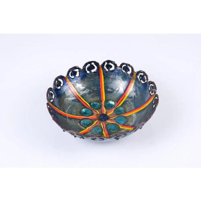 Hand made enameled copper bowl by Studio Cellini, Pesaro. Signed and remaining of a label. This piece has an attribution...