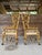 A striking pair of vintage faux bamboo rattan armchairs by French Heritage Furniture (North Carolina), featuring an...