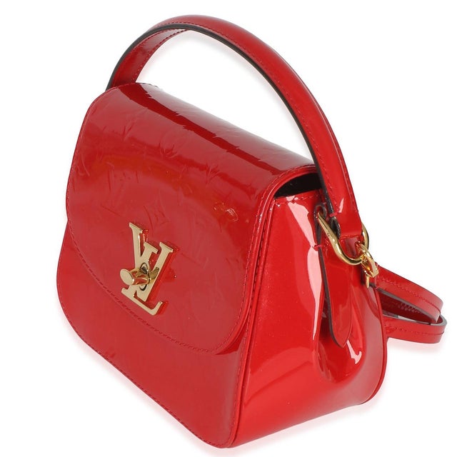 Item #: 153778 Interior Material: Fabric Dimensions: 7 x 6 x 3.5 in Features Interior: Two slip pockets Handle Drop: 3.00...