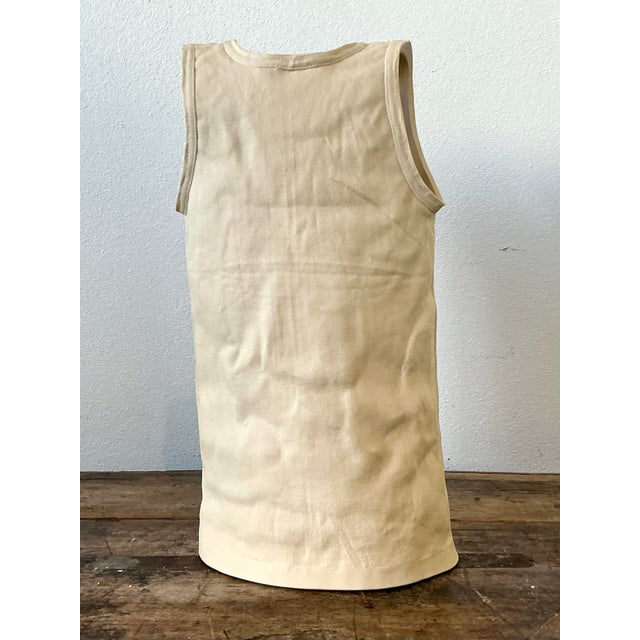 Elevate your art collection with this masterfully executed trompe l'oeil sculpture by the celebrated artist Michael...