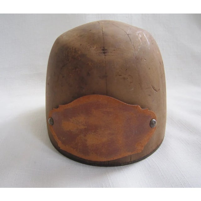 Wonderful vintage wood hat form/mold from the 30's. Has a leather label on the front and back of the form. Measures 5"H x...