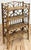 Stunning and substantial four tier wood and bamboo bookshelf. Features a Chinoiserie style look with a scorched bamboo...