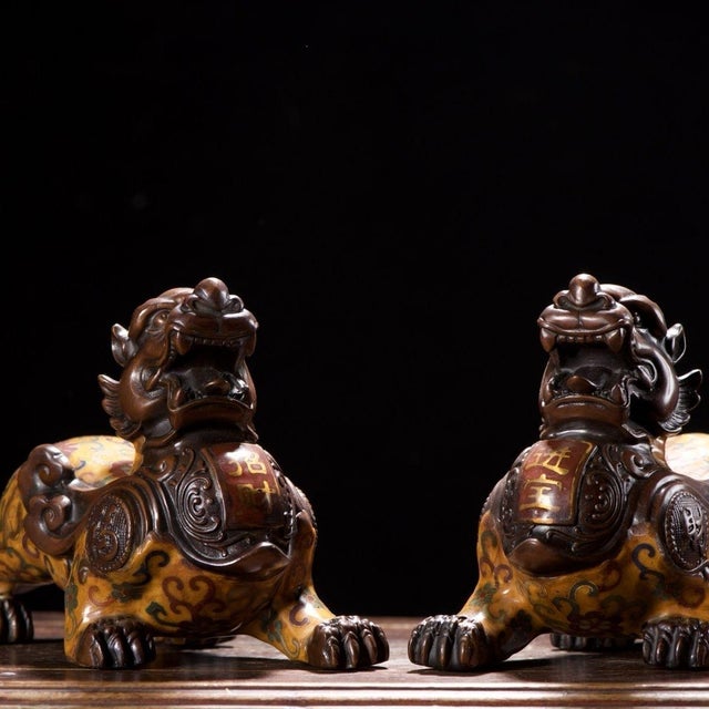 This is a magnificent pair of vintage Pixiu statues, mythical creatures in Chinese culture deeply associated with...