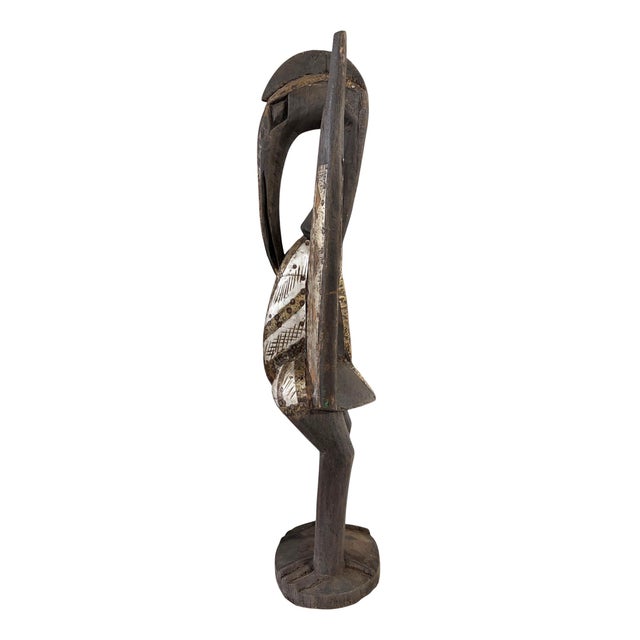 Superb &nbsp;vintage African Senufo Bird (Hornbill) Statue, hand-carved from a single piece of wood. 24" H × 6" W × 5" D....