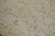 Room size Indian Dhurrie flat-weave carpet in warm pastel tones on a white field and mellow yellow border. Piece has...