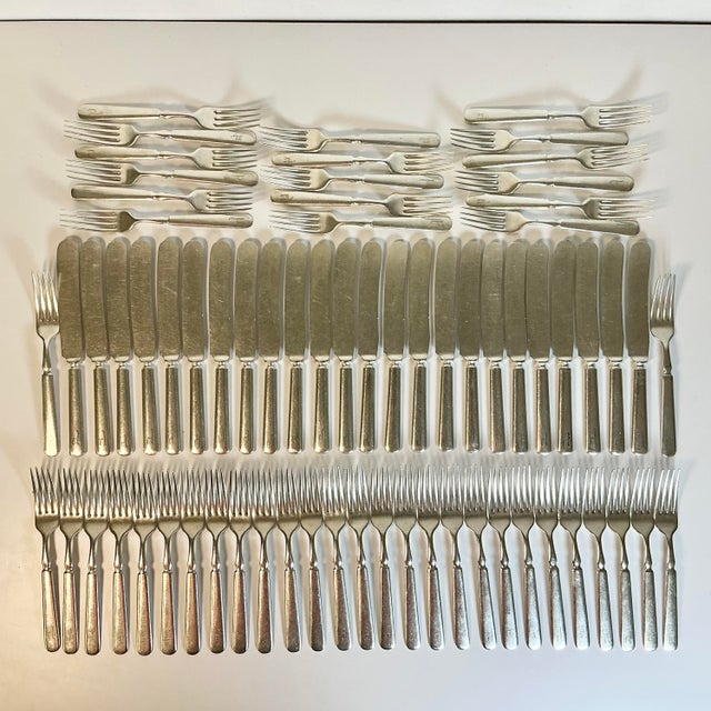 From our personal collection, this set of English Monogrammed Silver Plate Forks and Knives was curated in London about 15...