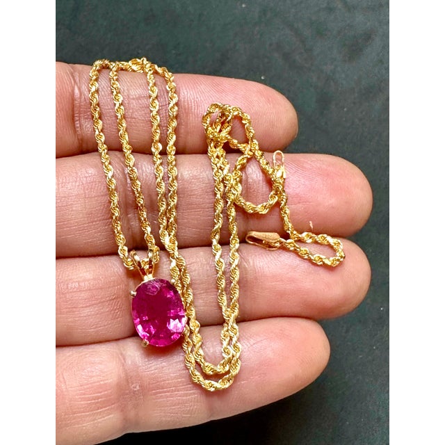 Approximately 4 Carat Oval Cut Natural Pink Tourmaline 14 Karat Yellow Gold Rope Necklace 18" Long Gold: 14 Karat Yellow...