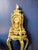 The Casa Padrino Baroque Grandfather Clock in Malachite Green and Gold is an extraordinary statement piece that embodies...