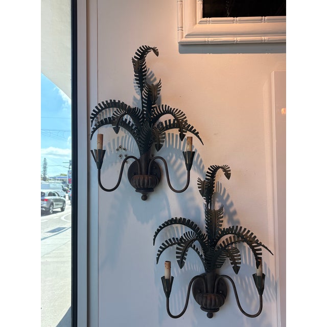 Vintage Palm Beach pair of Currey & Co. tropical, coastal island palm leaf leaves frond metal tole wall light sconces. I...