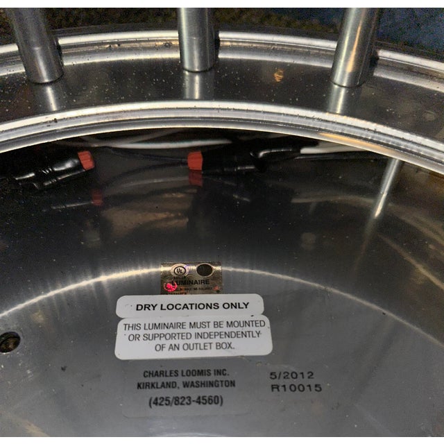 Elevate your space with a touch of vintage space-age elegance. The Reggiani Style Chandelier is a Mid-Century Modern...