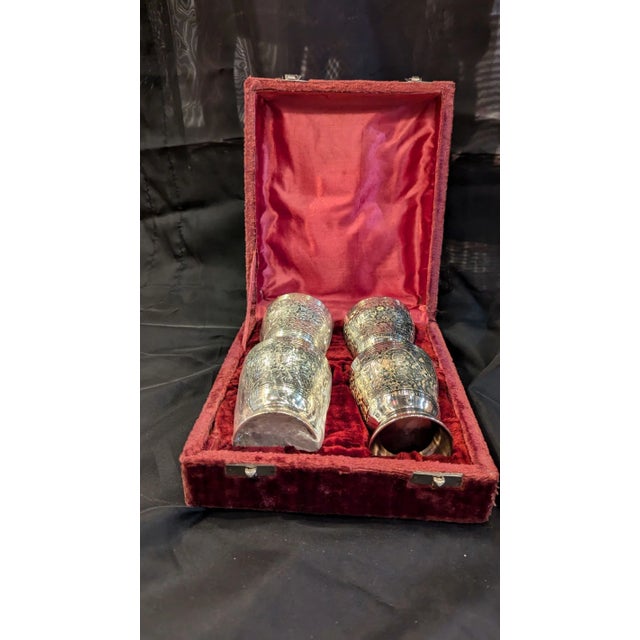 Hollywood Regency silverplate wedding/anniversary toasting cups in original velvet lined box. The etching on these are...