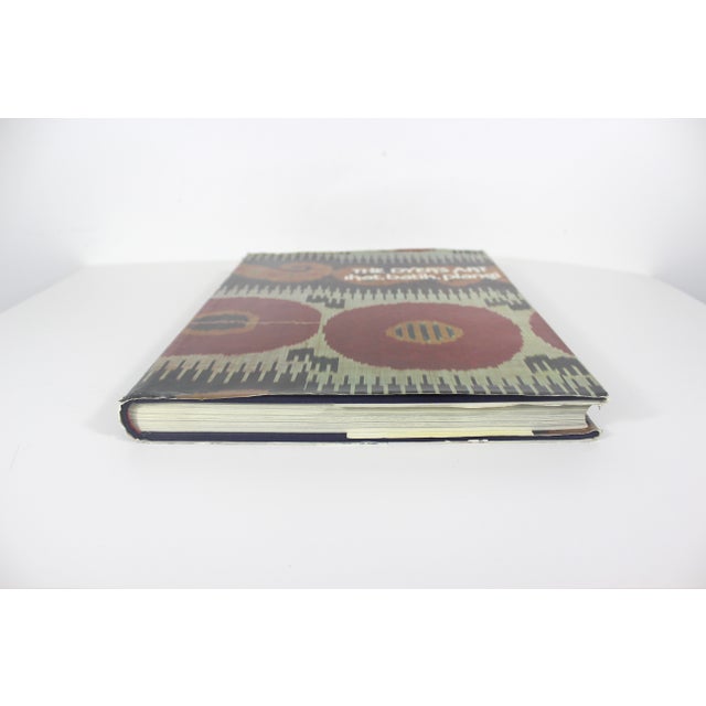 1976 The Dyer’s Art Ikat, batik, plangi Hardcover coffee table art book with dust jacket. This is a large sized book. The...