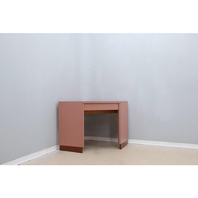 Stylish and original petineuse vintage design attributed to Ettore Sottsass and produced in Italy during 1960s. It is made...