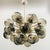 Italian oval shaped sputnik chandelier with 24 smoky Murano glass globes carefully hand blown with bubbles inside the...